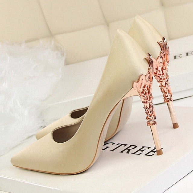 CARVED HEEL SATIN PUMPS
