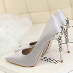 CARVED HEEL SATIN PUMPS