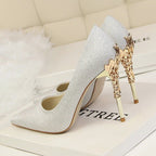 CARVED HEEL SATIN PUMPS