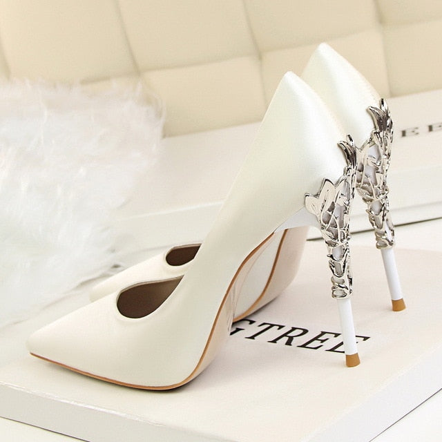 CARVED HEEL SATIN PUMPS