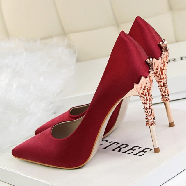 CARVED HEEL SATIN PUMPS